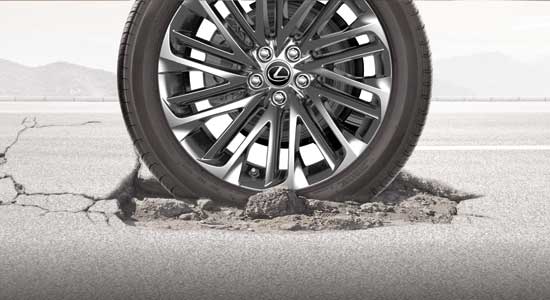 Tire on cracked road