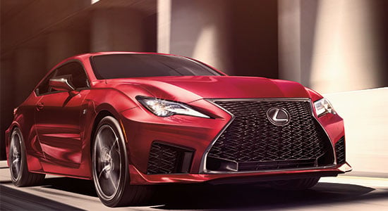 Lexus driving down road
